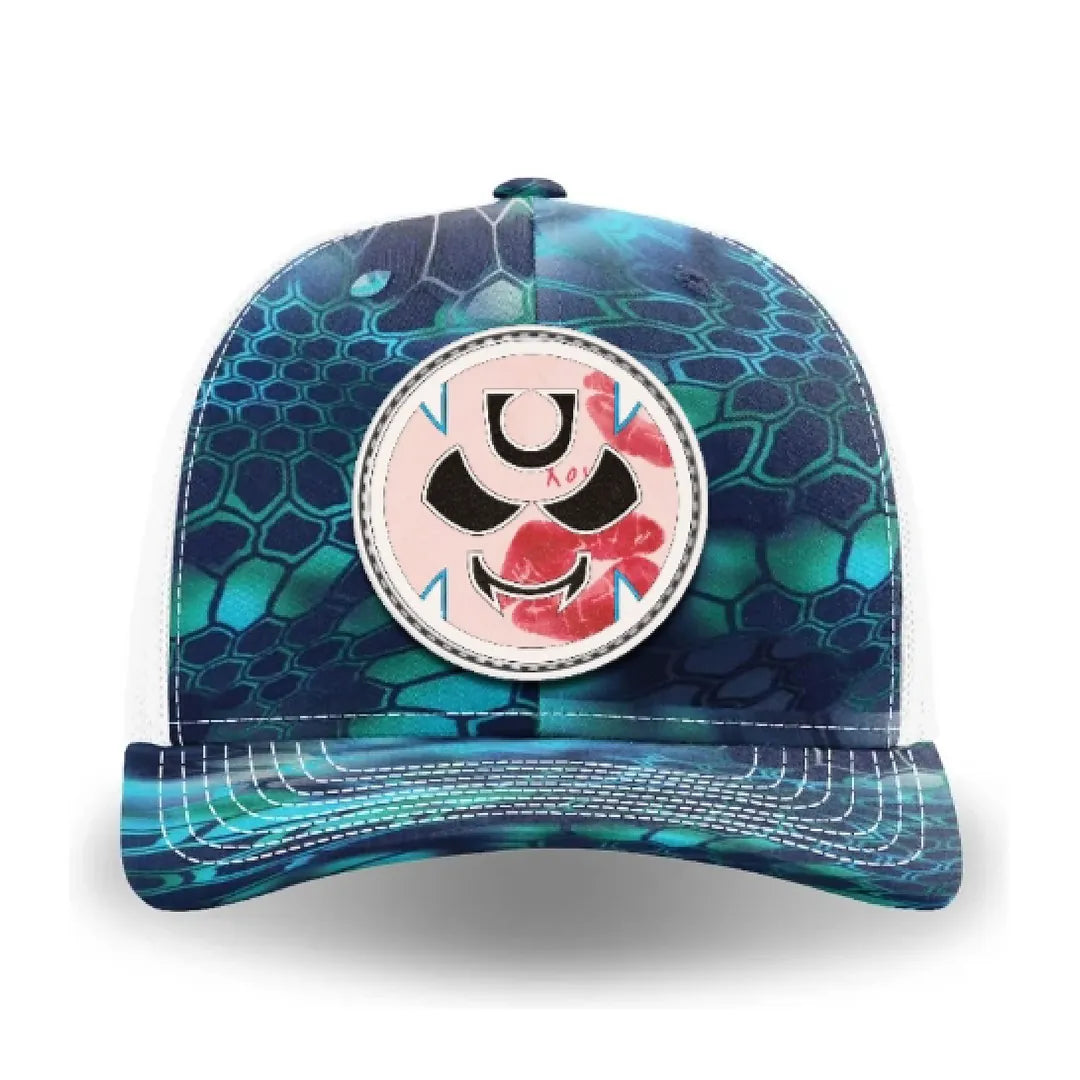 Blue and black Kryptek Typhon trucker cap with a front leather patch featuring the Gutter Brudderz Monster #1 logo.