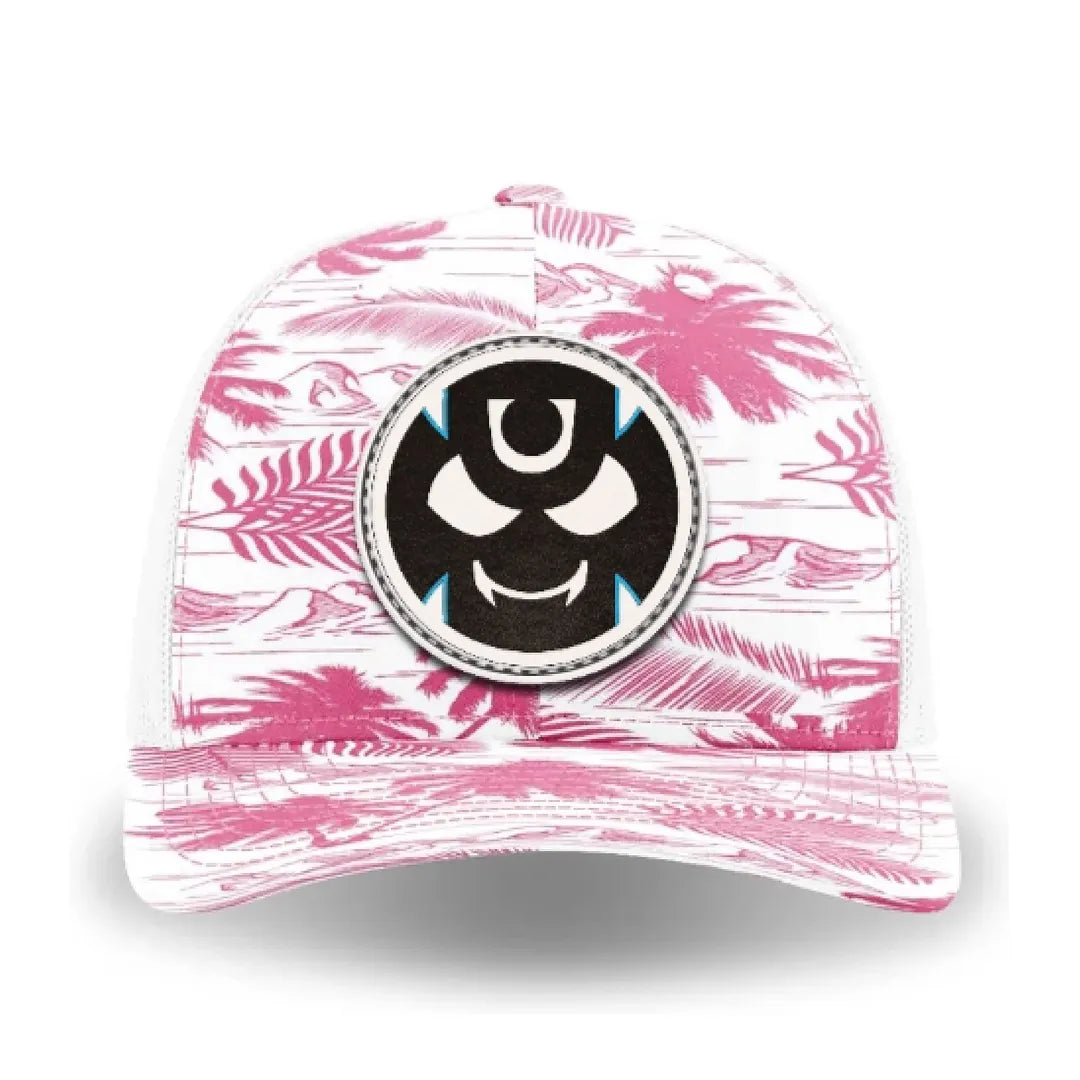 Pink and white Paradise-pattern trucker cap with a front leather patch featuring the Gutter Brudderz Monster #3 logo. 