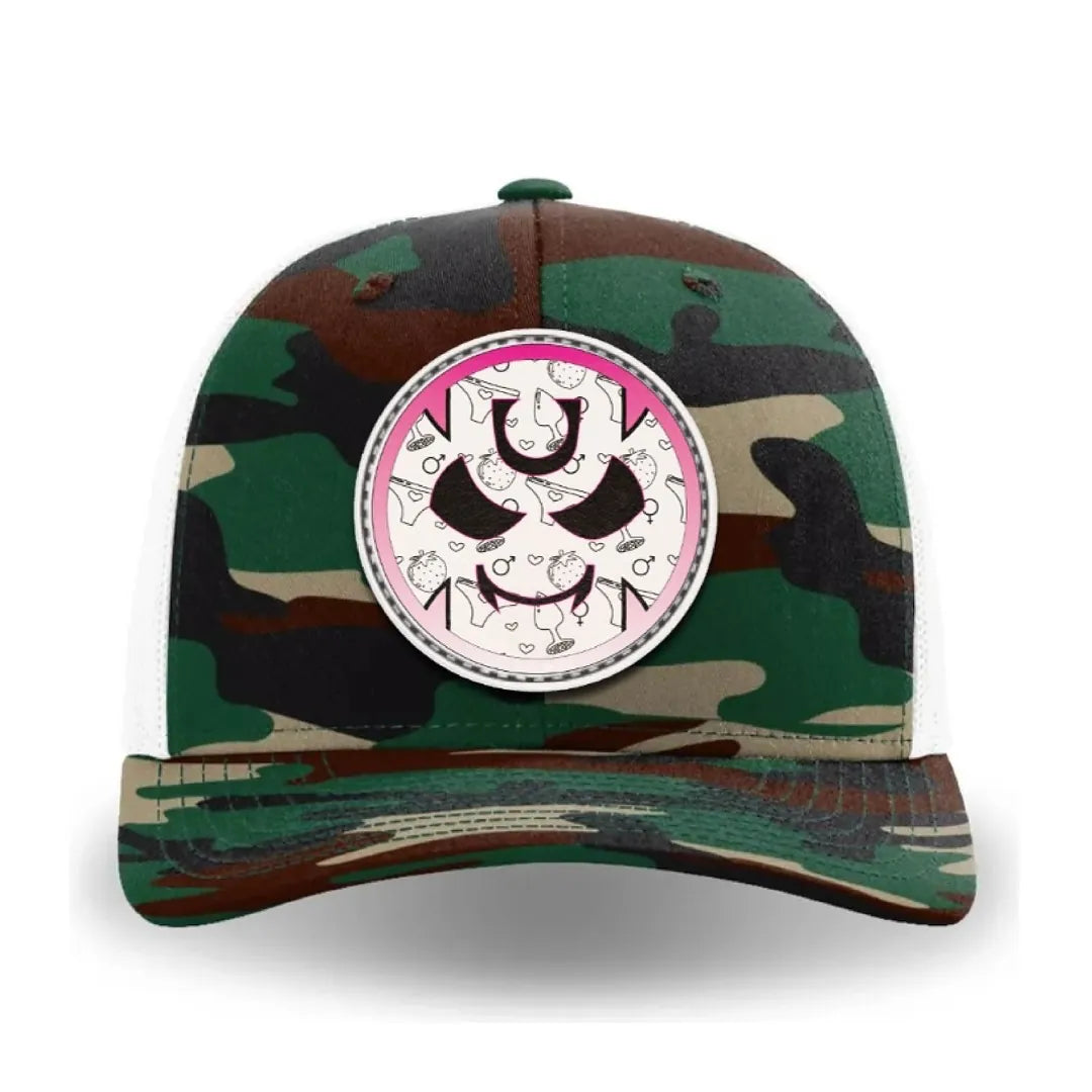 Green and brown Traditional Camouflage trucker cap with a front leather patch featuring the Gutter Brudderz Monster #4 logo.