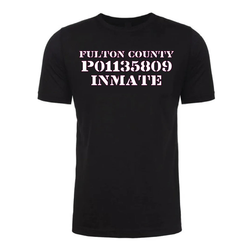 Front view of a black Gutter Brudderz T-shirt featuring ‘The Tourist’ graphic with the text ‘Fulton County P01135809 Inmate.