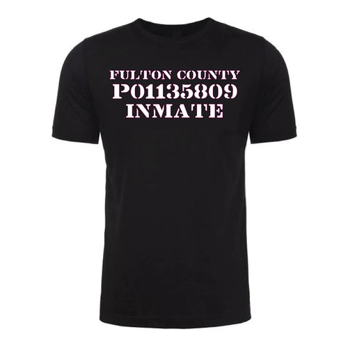 Front view of a black Gutter Brudderz T-shirt featuring ‘The Tourist’ graphic with the text ‘Fulton County P01135809 Inmate.